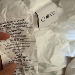 Quince Soft White Polyester Bedding and a cover